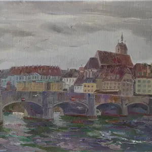 The Middle Bridge with dark clouds in Basel